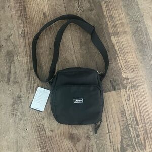 The Foldie Sling Bag Black Crossbody Bag